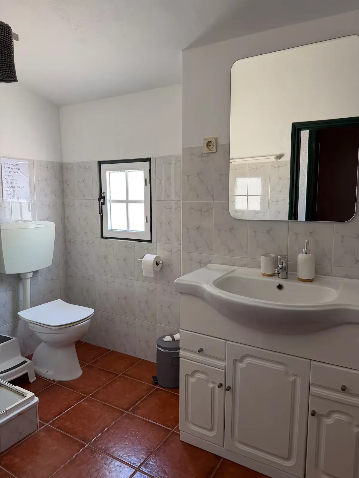 Bathroom with basin and window