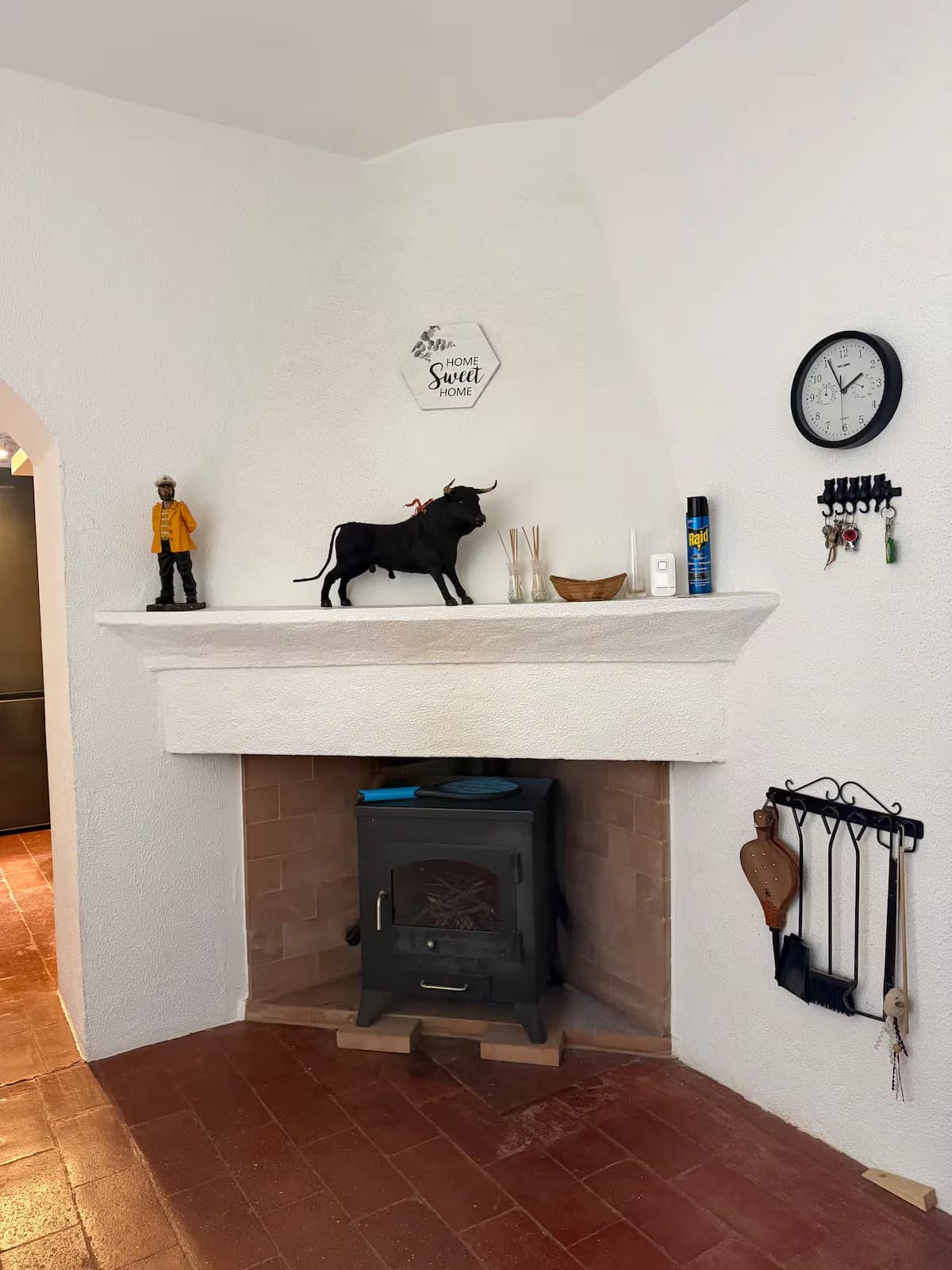Sitting-room fireplace with a whitewashed mantel